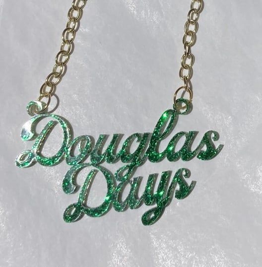 Glittery green necklace with the name 