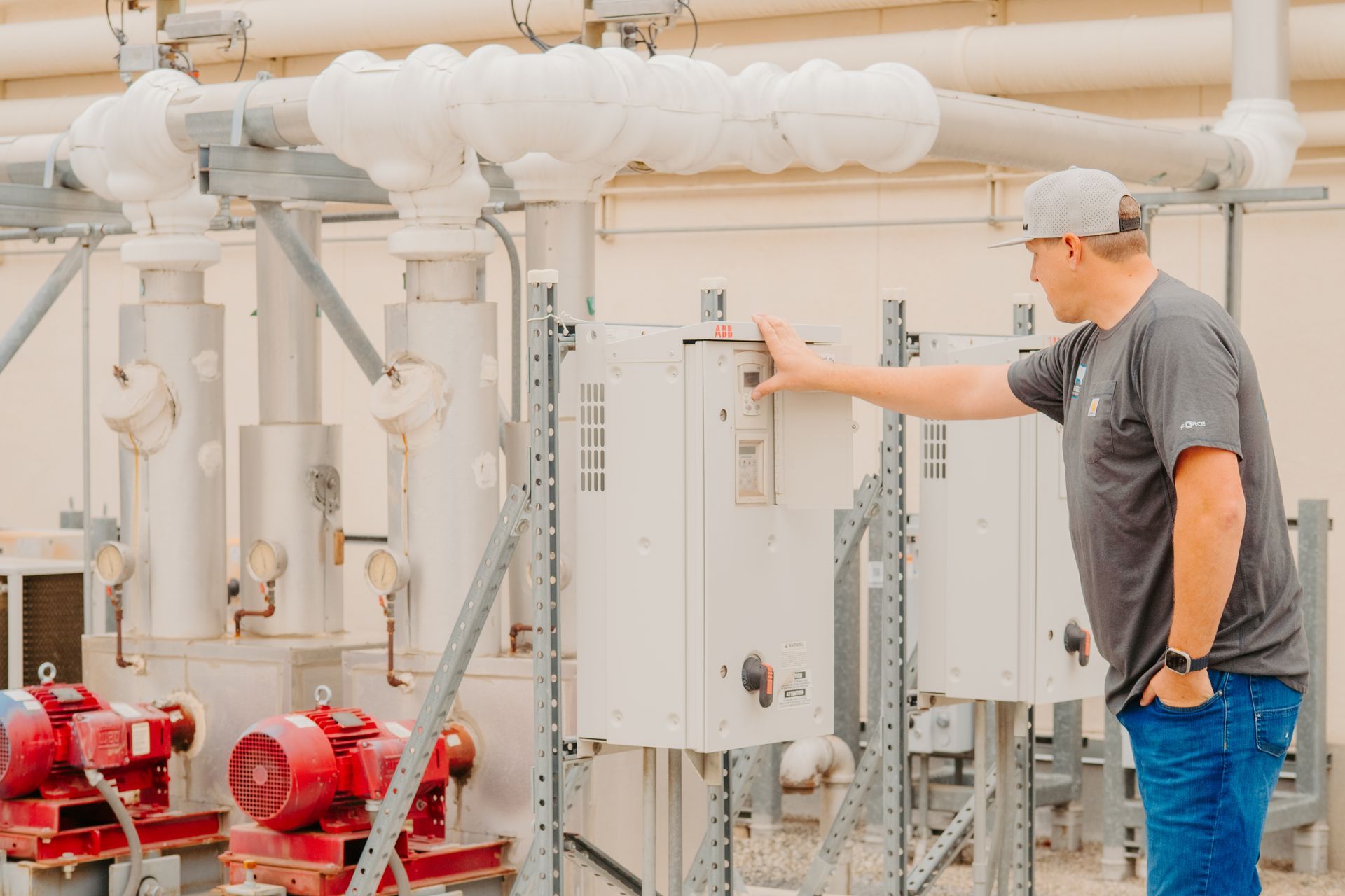 An air conditioner is sitting inside of a closet.