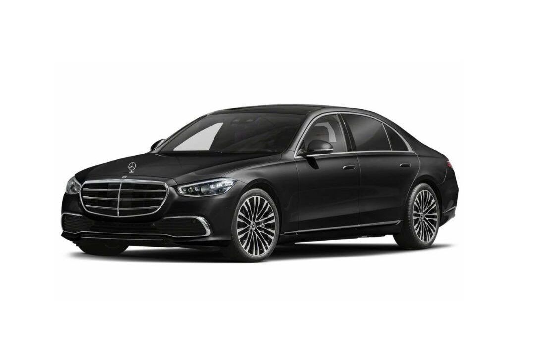 A black mercedes benz s class sedan is shown on a white background.