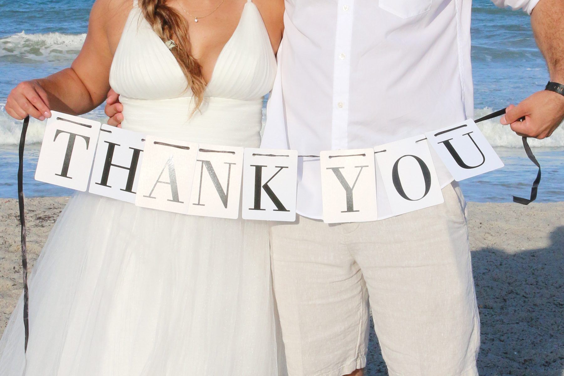 Bride and groom holding a