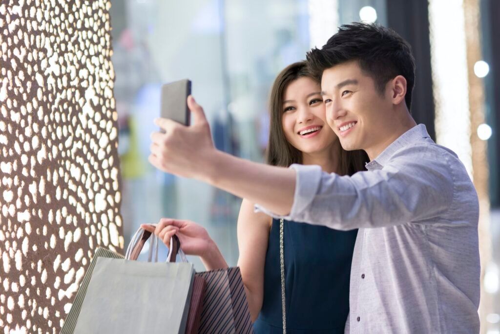 Happy young couple shopping