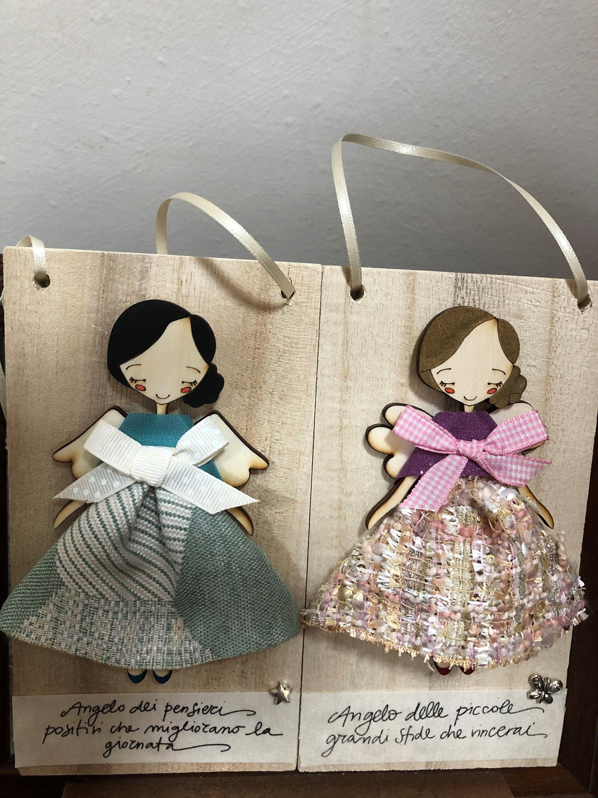 2 bamboline da appendere con slogan