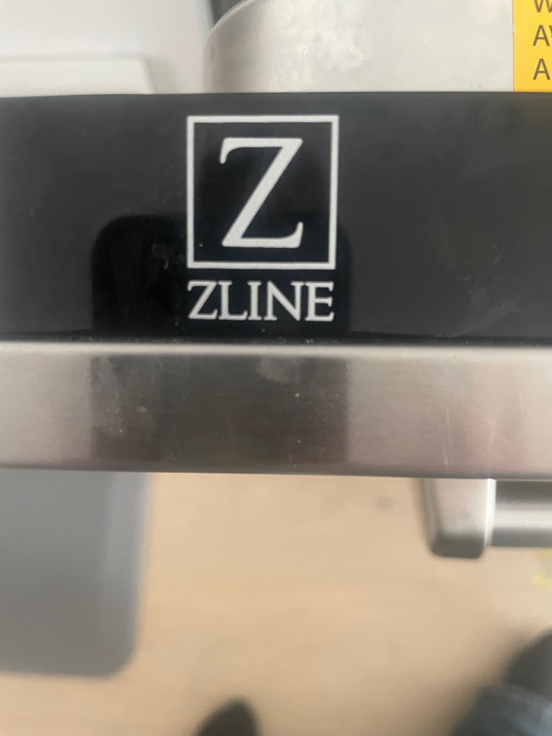 Zline brand logo on a black surface. The logo features a white 
