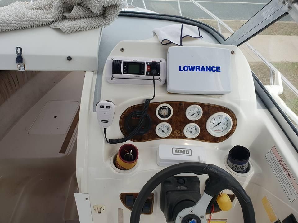 The Dashboard of a Boat Has a Lowrance Radar on It — Jacko's Auto & Marine Electrics In Mackay Harbour, QLD