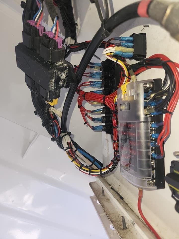 A Bunch of Wires Are Connected to a Fuse Box — Jacko's Auto & Marine Electrics In Mackay Harbour, QLD