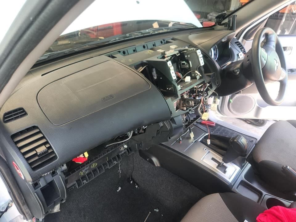 The Inside of a Car With the Dashboard Removed — Jacko's Auto & Marine Electrics In Mackay Harbour, QLD