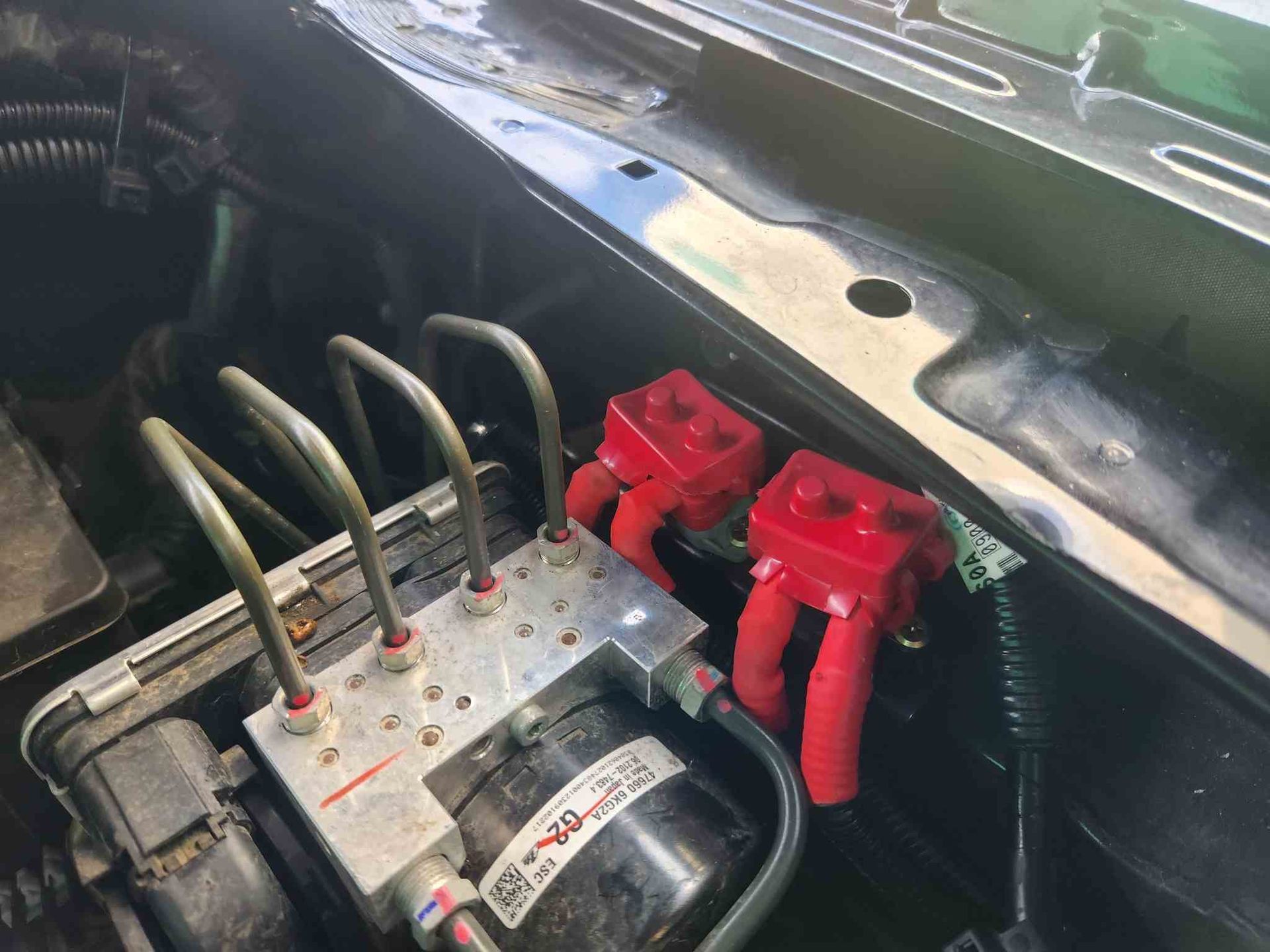 A Close Up of a Brake System in a Car — Jacko's Auto & Marine Electrics In Mackay Harbour, QLD