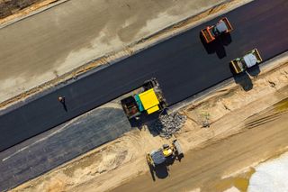 Paving Services — Road Rollers Working on the Construction in Indianapolis, IN