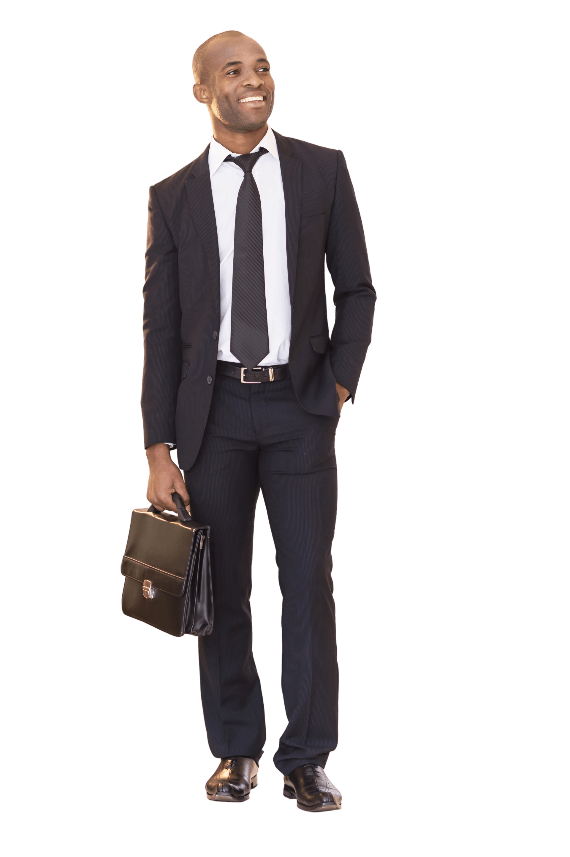 a man in a suit and tie is holding a briefcase .