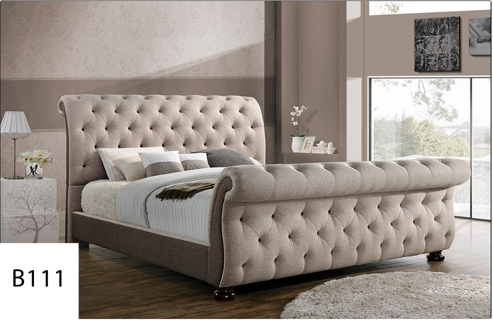 A bed with a tufted headboard is in a bedroom.