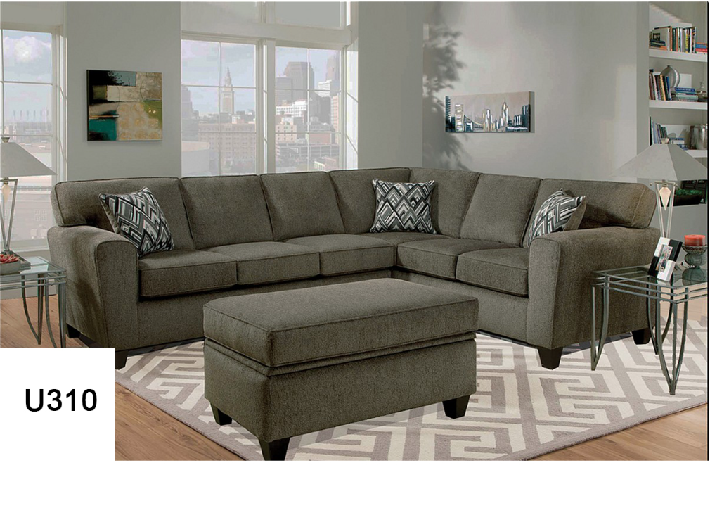 A living room with a sectional couch and an ottoman