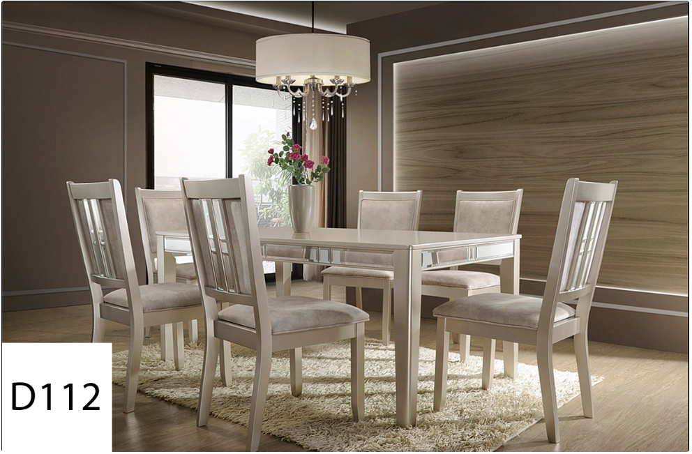 A dining room with a table and chairs and a chandelier