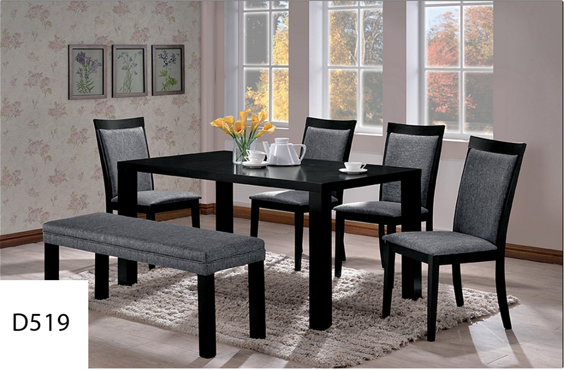 A dining room with a table and chairs and a bench