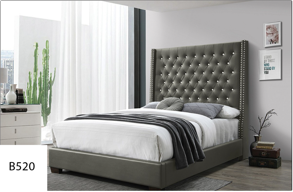 A bedroom with a bed , dresser and mirror.