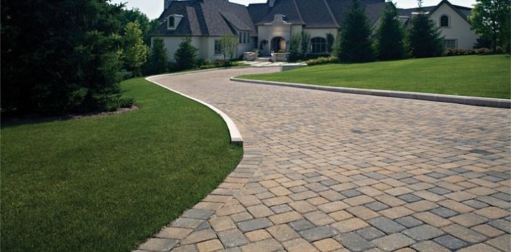 Side-by-side view of a patio and driveway installation in Richmond, London