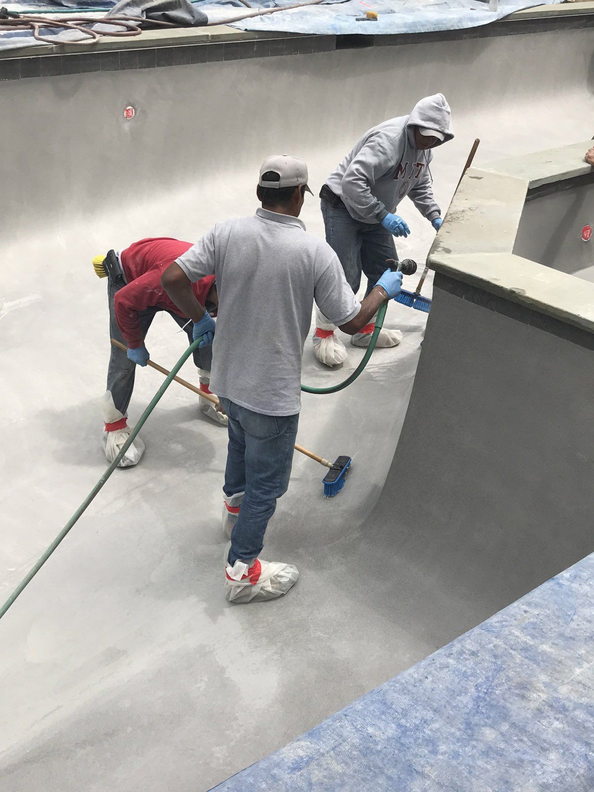 Workers Resurfacing the Pool — Norwalk, CT — Rave Pools