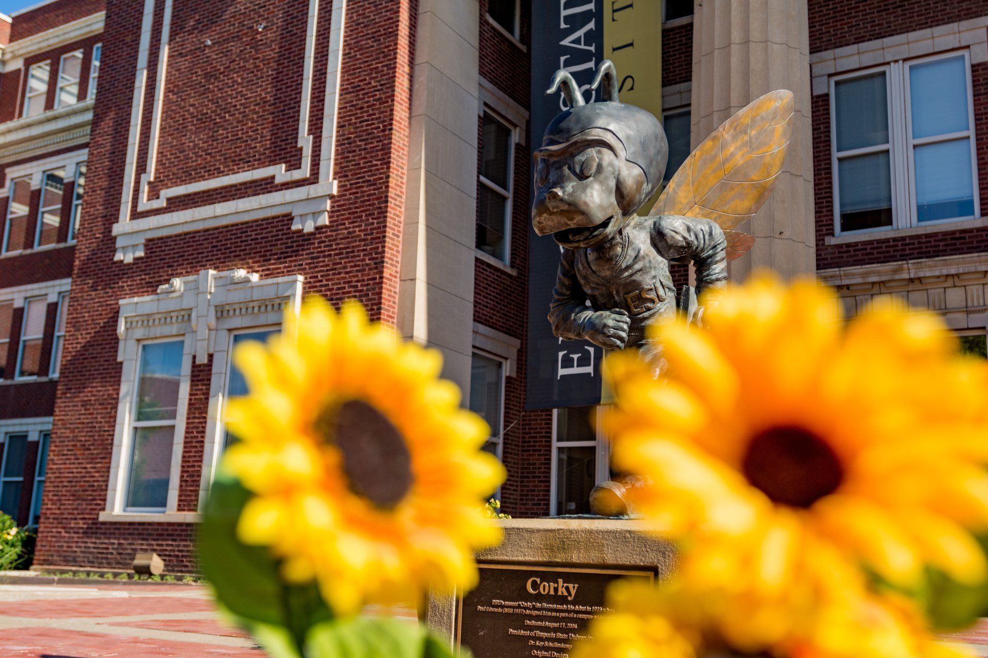 Corky Statue with Sunflowers
