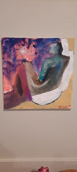 Painting of a figure reclining, with a blue body and a colorful sunset sky.