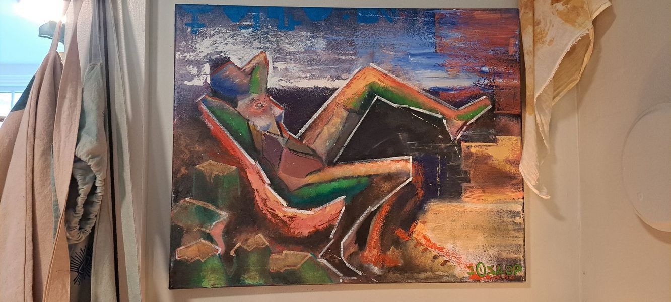 Abstract painting of a figure reclining in a chair, with colorful hues against a textured background.