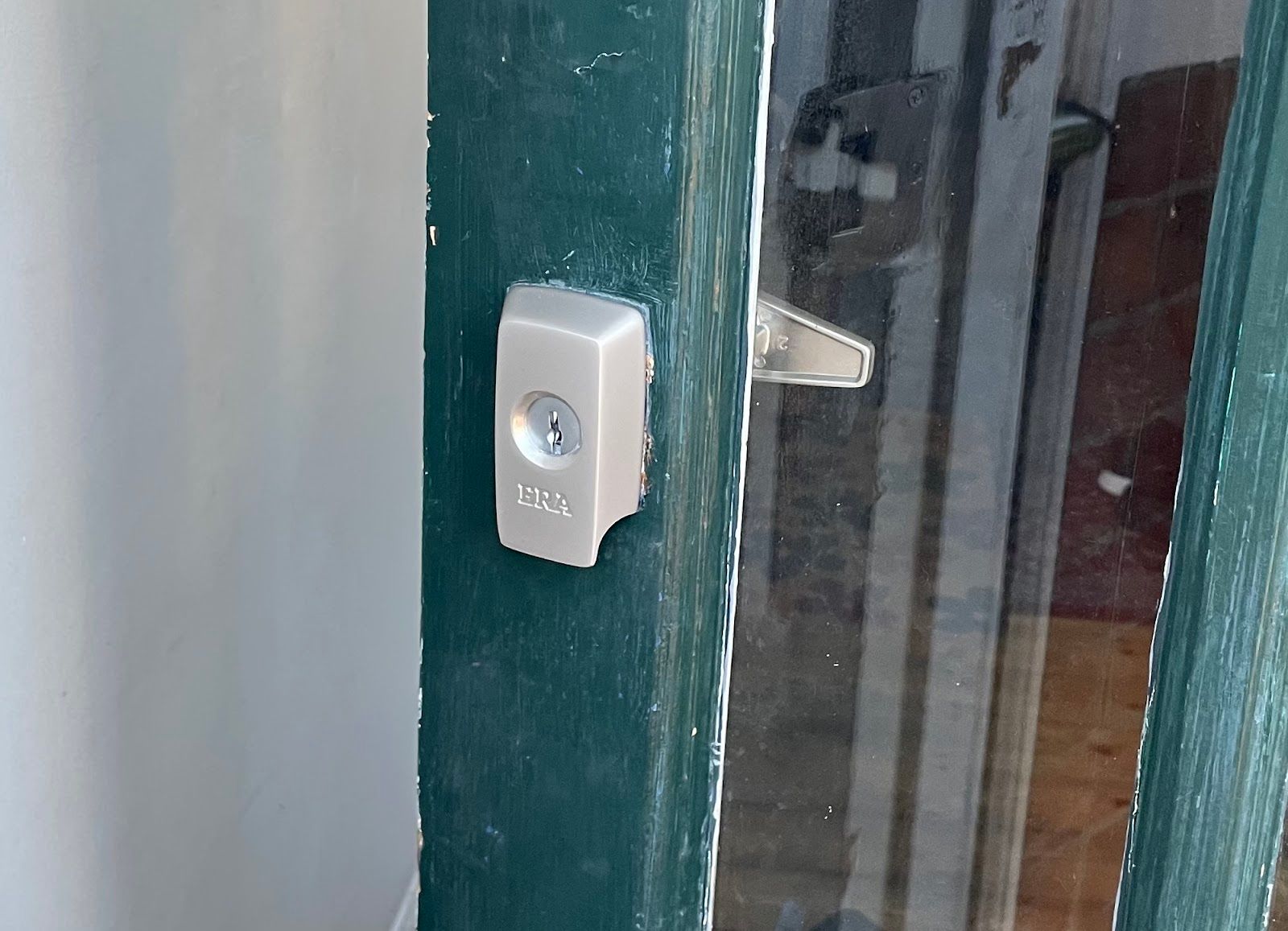 A close up of a door with a lock on it.