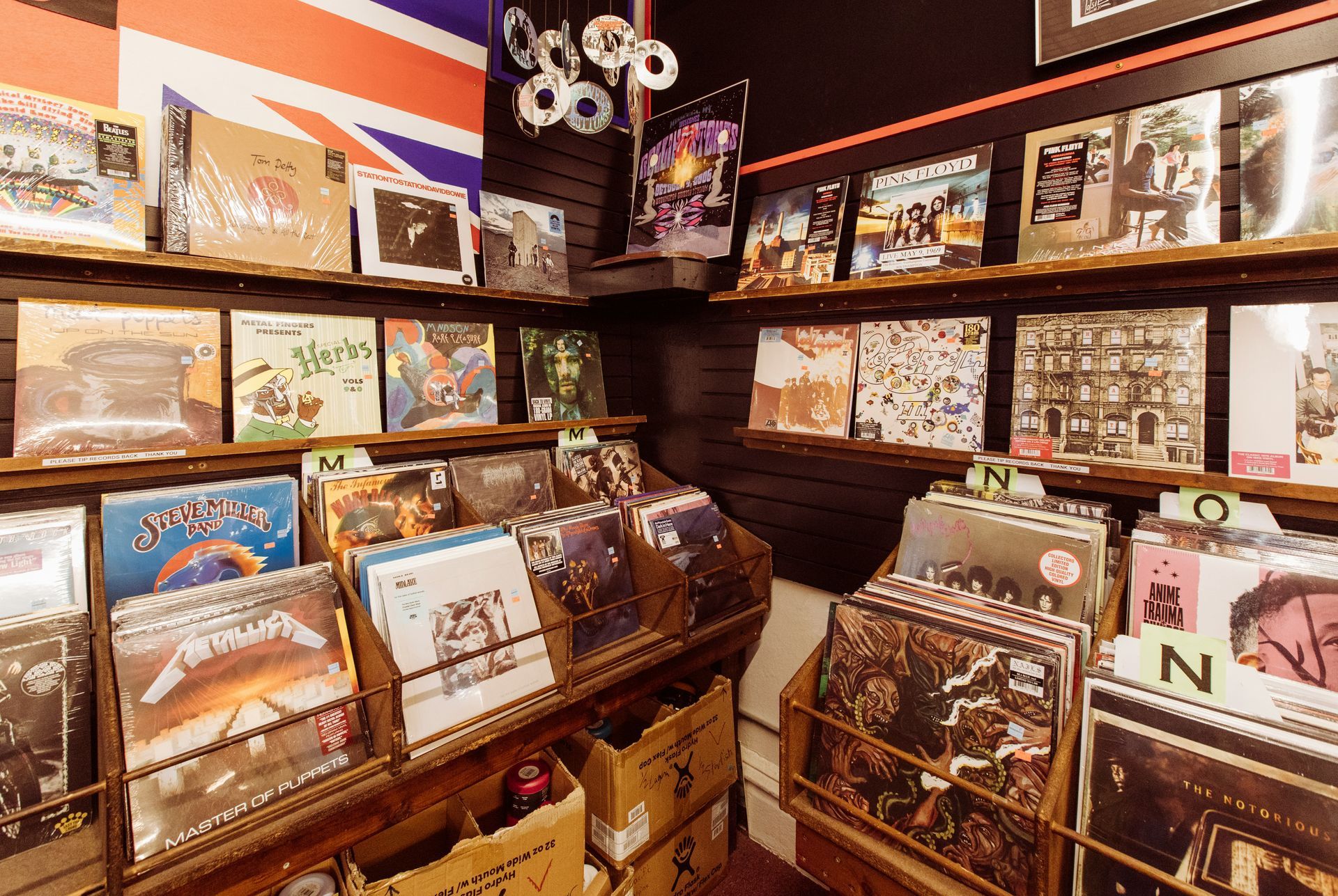 A store filled with lots of records including metallica