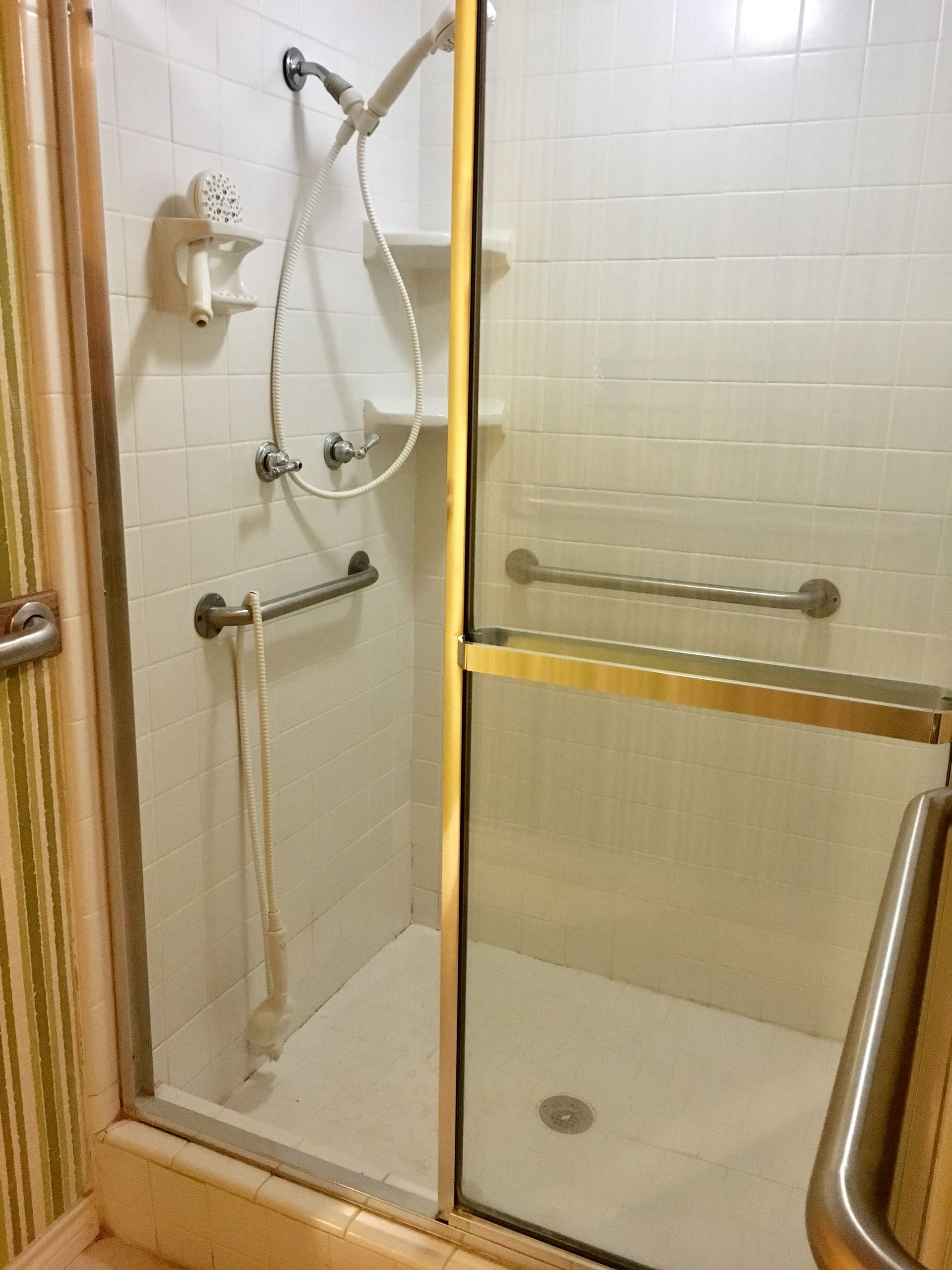 Small shower in Flower Mound, TX, undergoing renovation by Night 'N' Day Construction to be transformed into a spacious, modern shower.