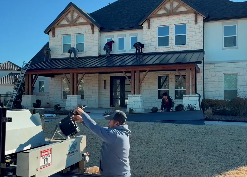 Night 'N' Day roofers are installing a combination of Standing Seam and Composition roofing on this house in Roanoke, Tx.