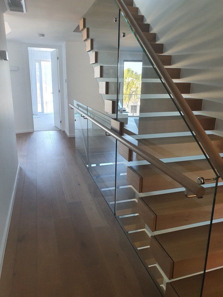 Stairs With Glass Banister — Timberfection Queensland in Gold Coast, QLD