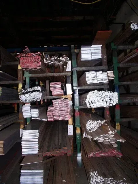 A warehouse filled with lots of different types of metal.