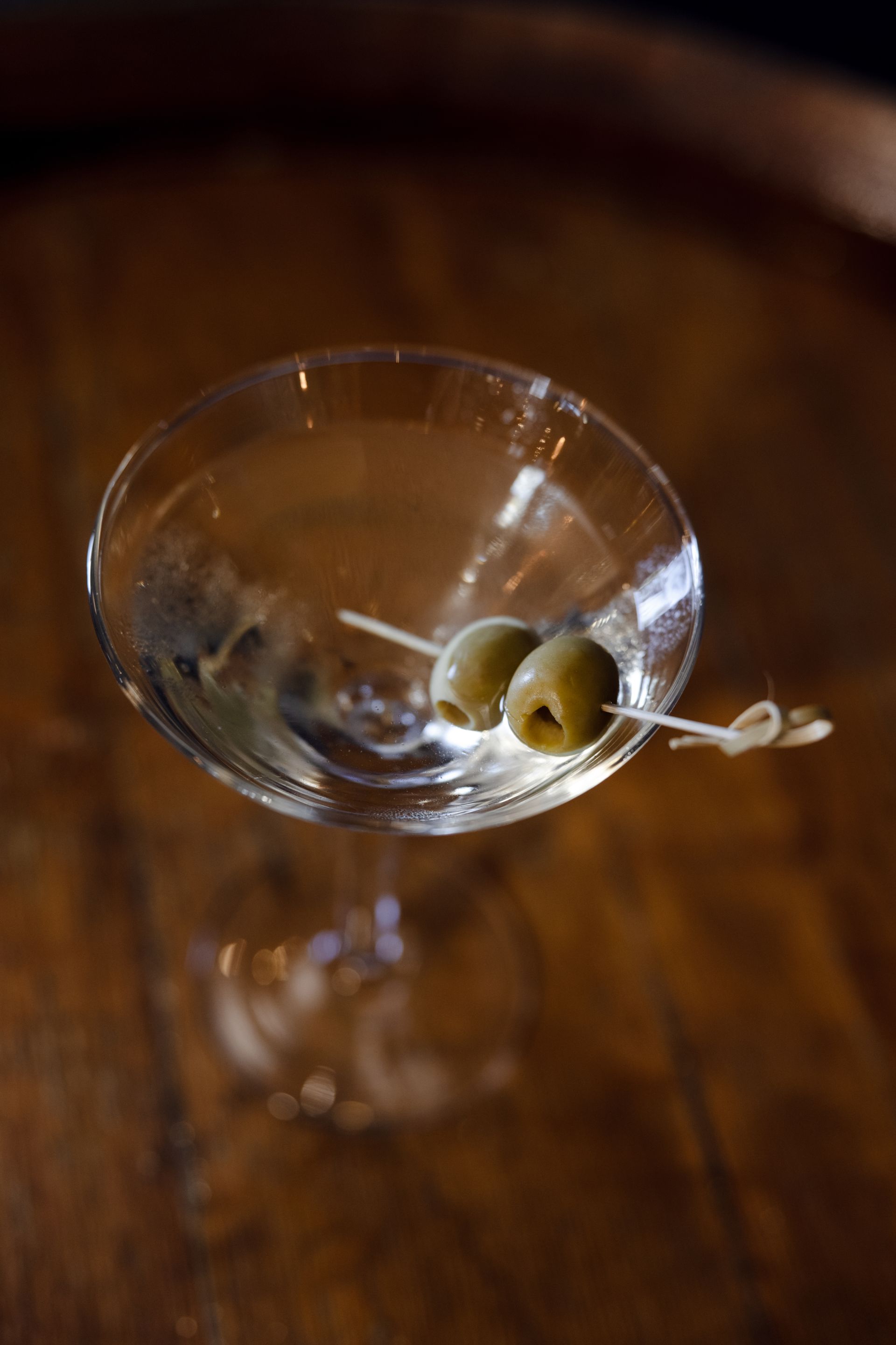 martini cocktail made with Native Dry Gin in a coupe glass with olive