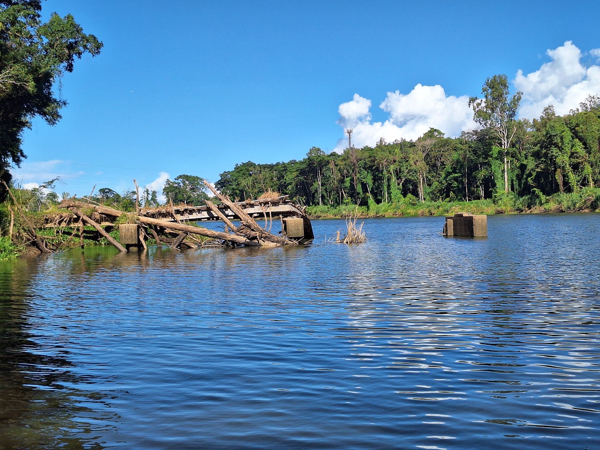 A damaged bridge in river — Tailored Spatial Solutions in Cairns City, QLD