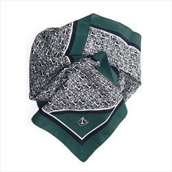 Green and white patterned silk scarf.
