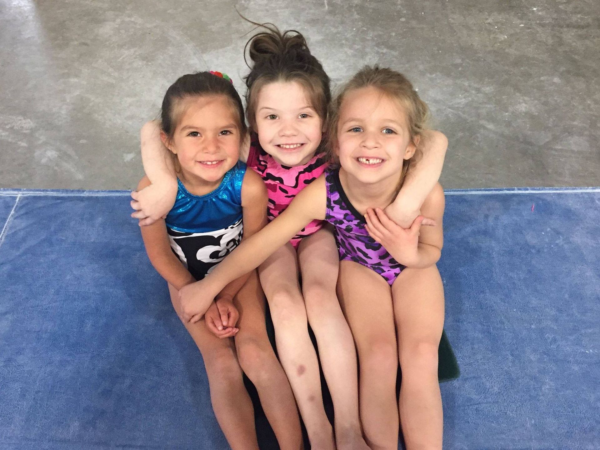 Little Gymnast With Her Coach