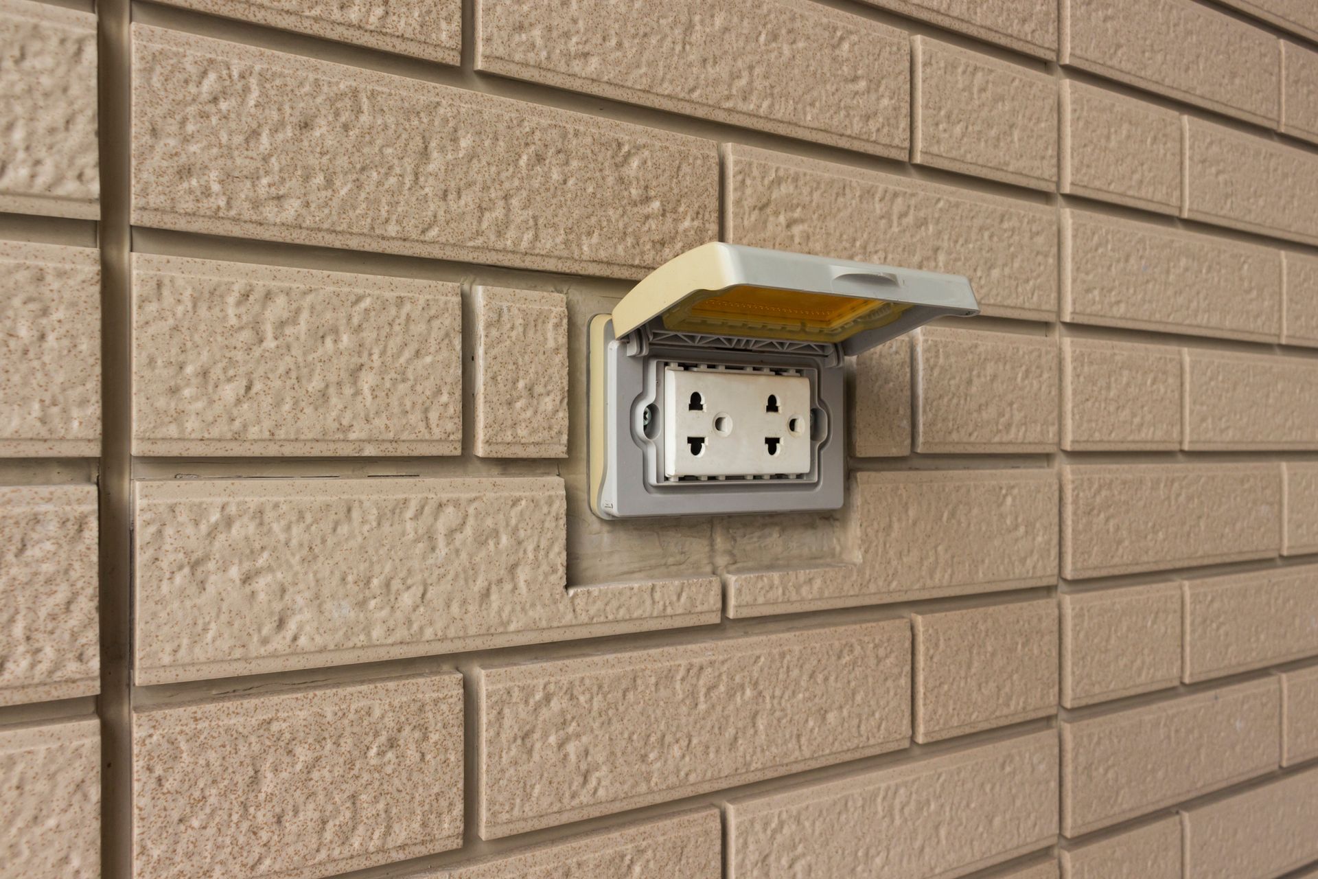 Outdoor electrical outlet outside of New Jersey home.