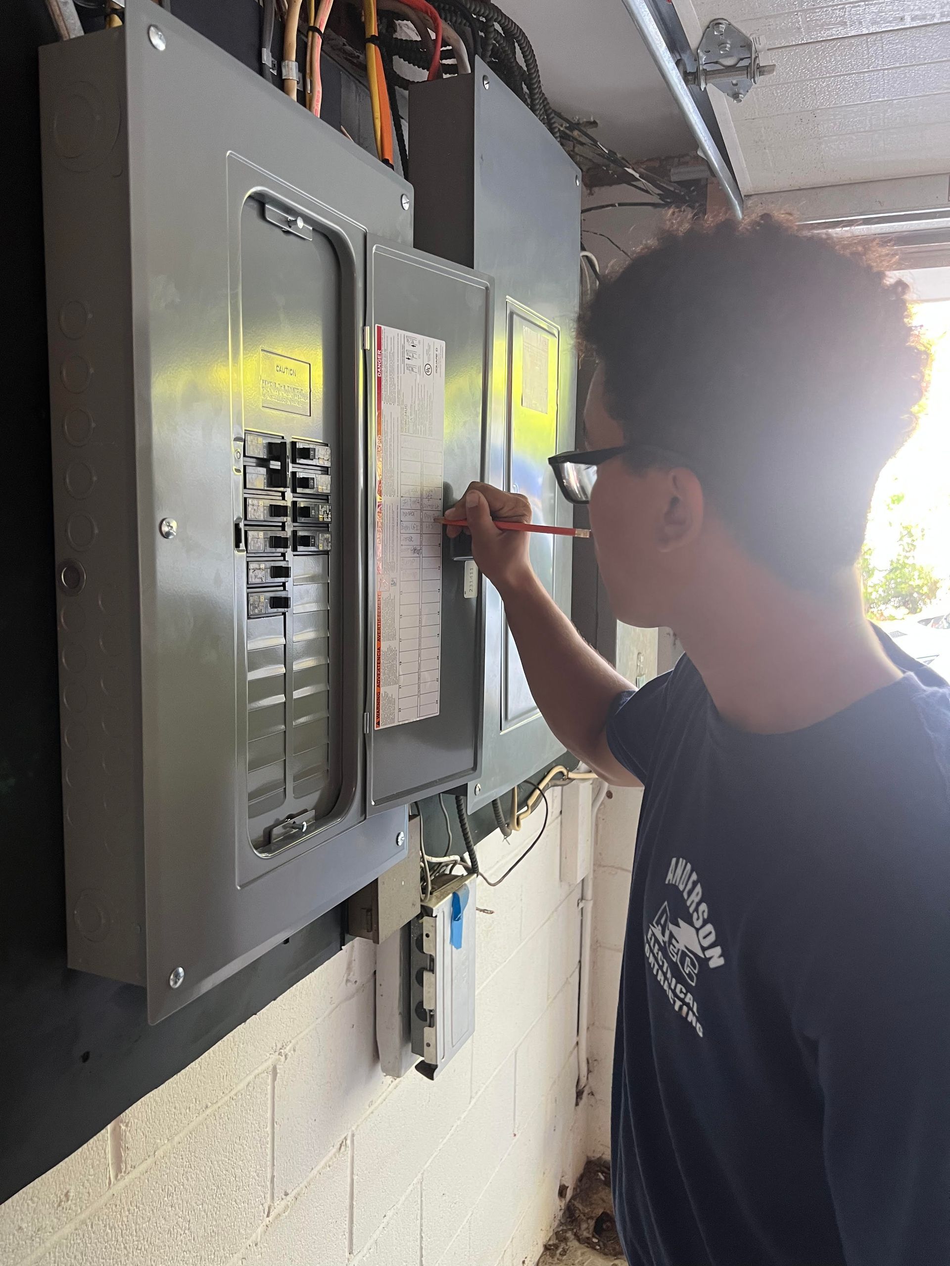 An electrical panel being upgraded by Anderson Electric