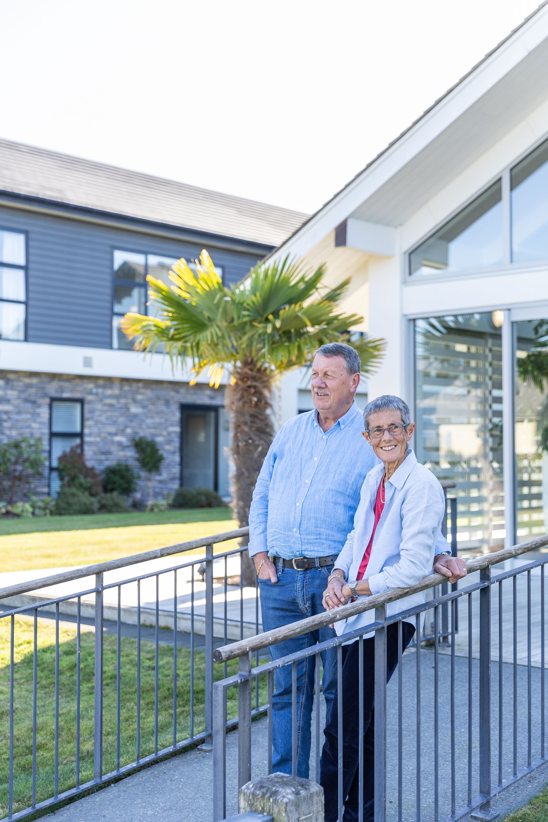 Residents enjoying sunny day outside the lodge