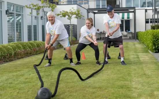Residents doing outdoor fitness