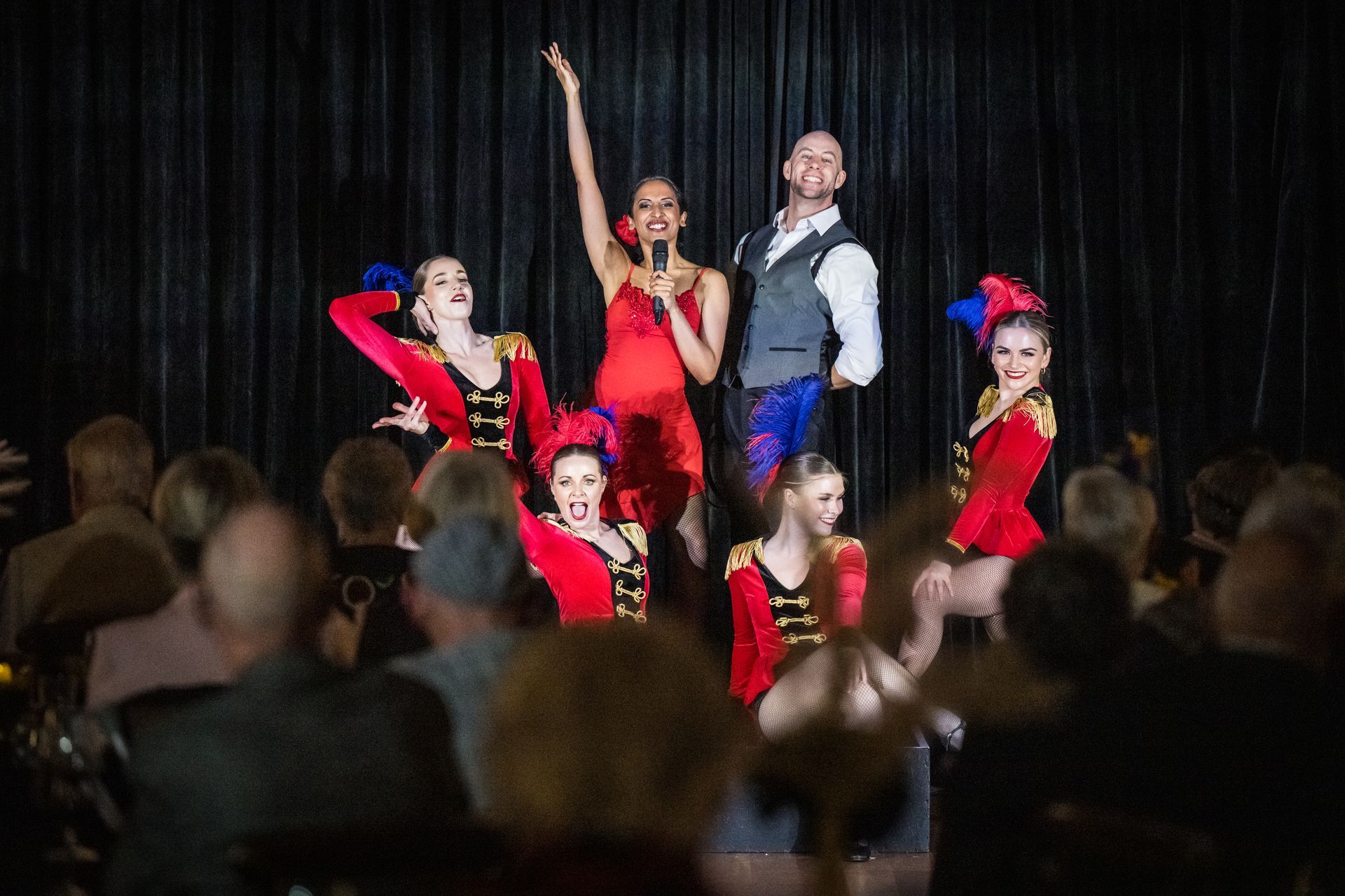 Residents watching musical dance performance