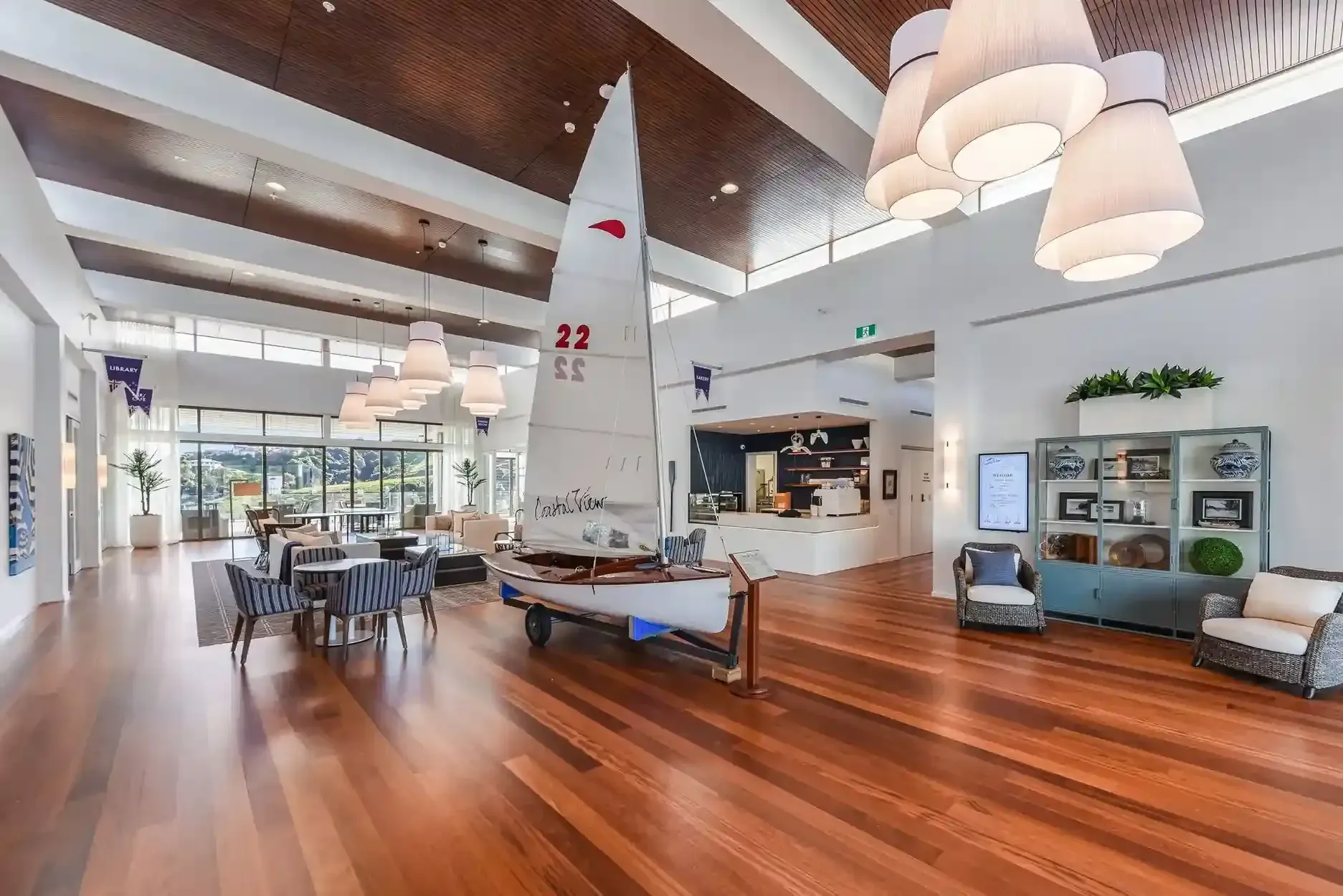 Yacht Club village lounge with sailboat