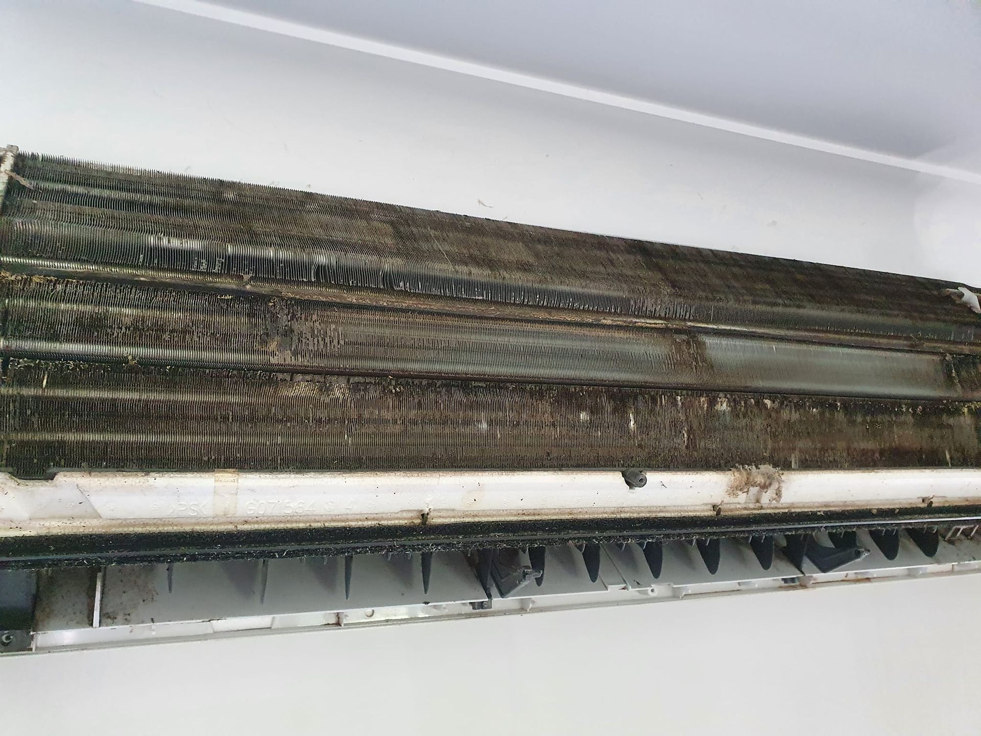 An Air Conditioner Unit with Dust and Grime — Coach That Cleans in Edmonton, QLD