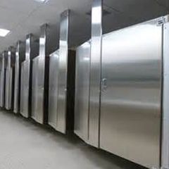 Row of toilet partitions in a pristine industrial lavatory - Building specialty products in Blackwood, NJ