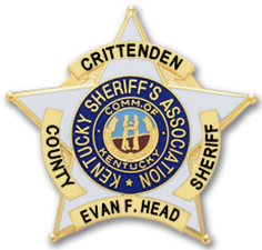 A crittenden county sheriff 's badge on a white background