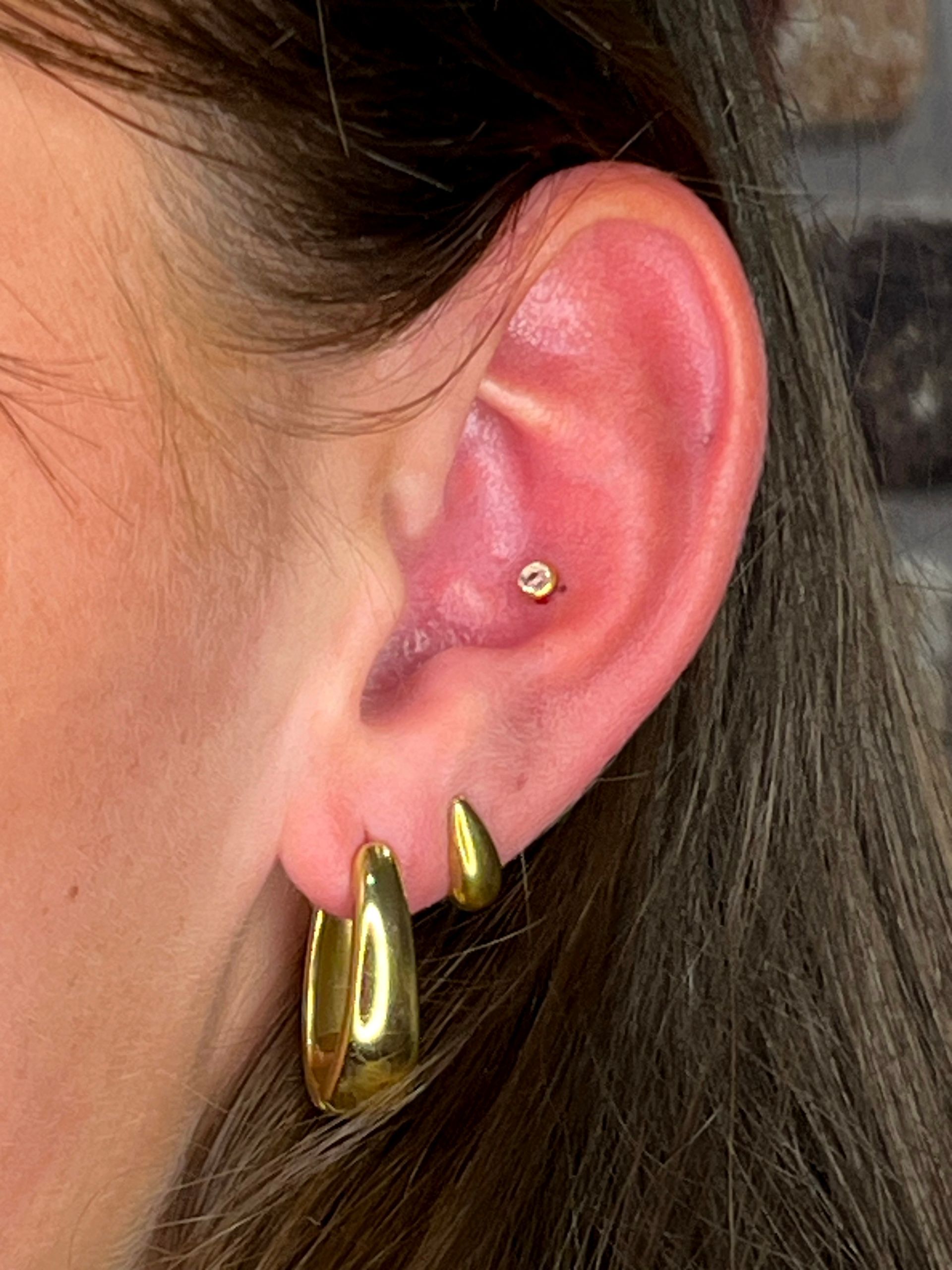 Conch piercing Kampen