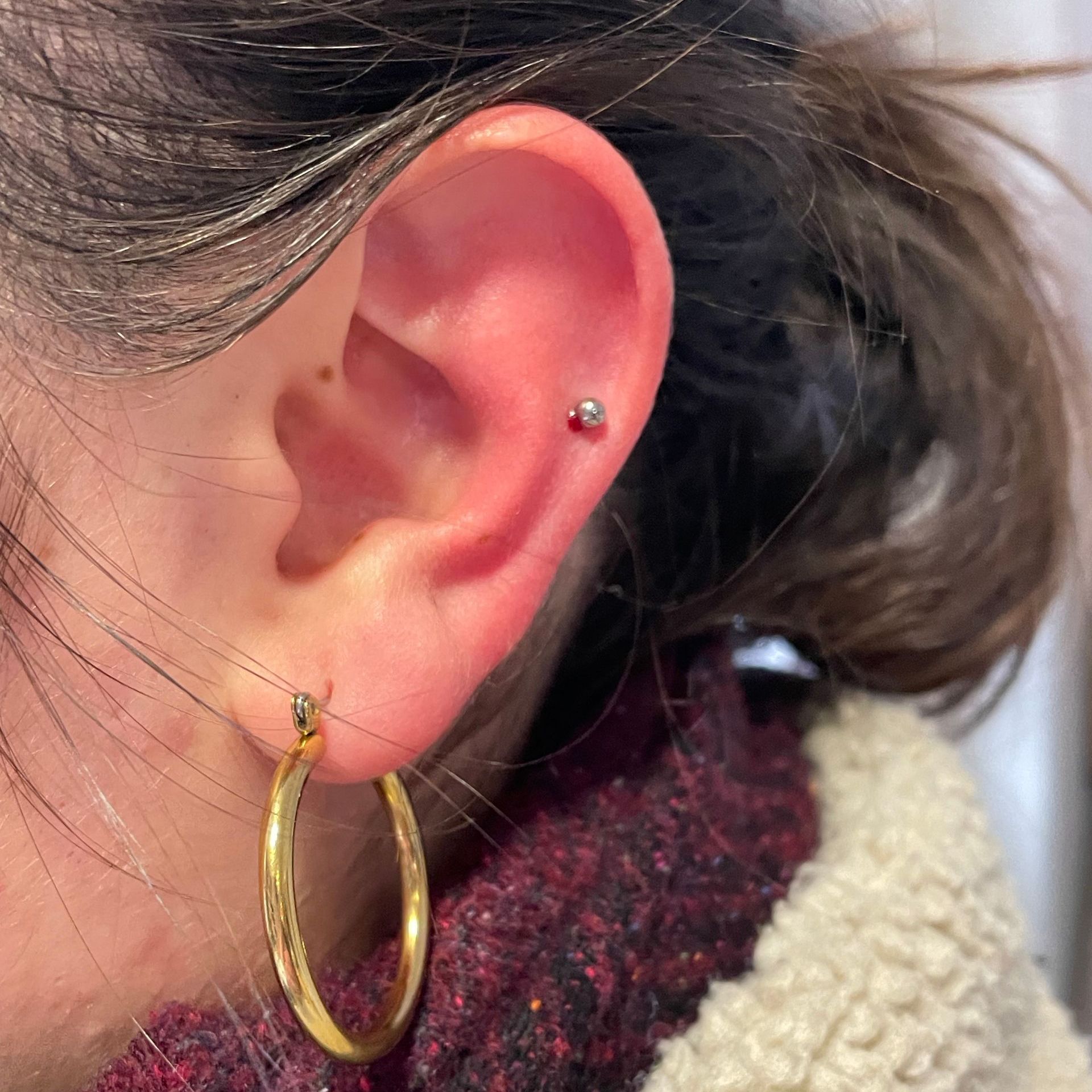 Lagere helix in het midden van de oorschelp