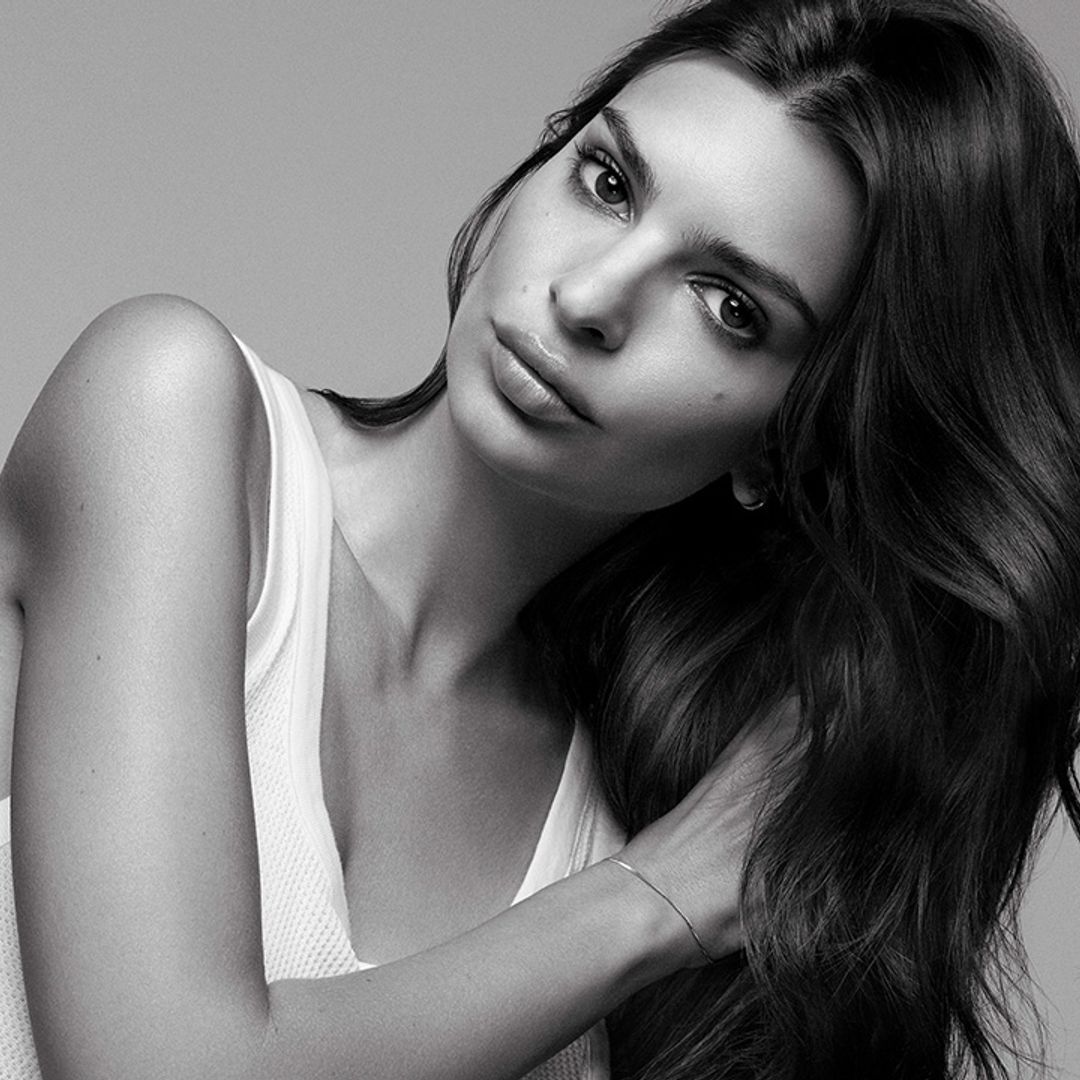 A black and white photo of a woman with long hair