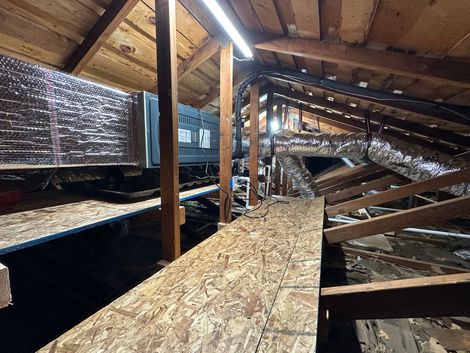 Installed HVAC system with ductwork in attic space for heating and cooling in Southern California homes