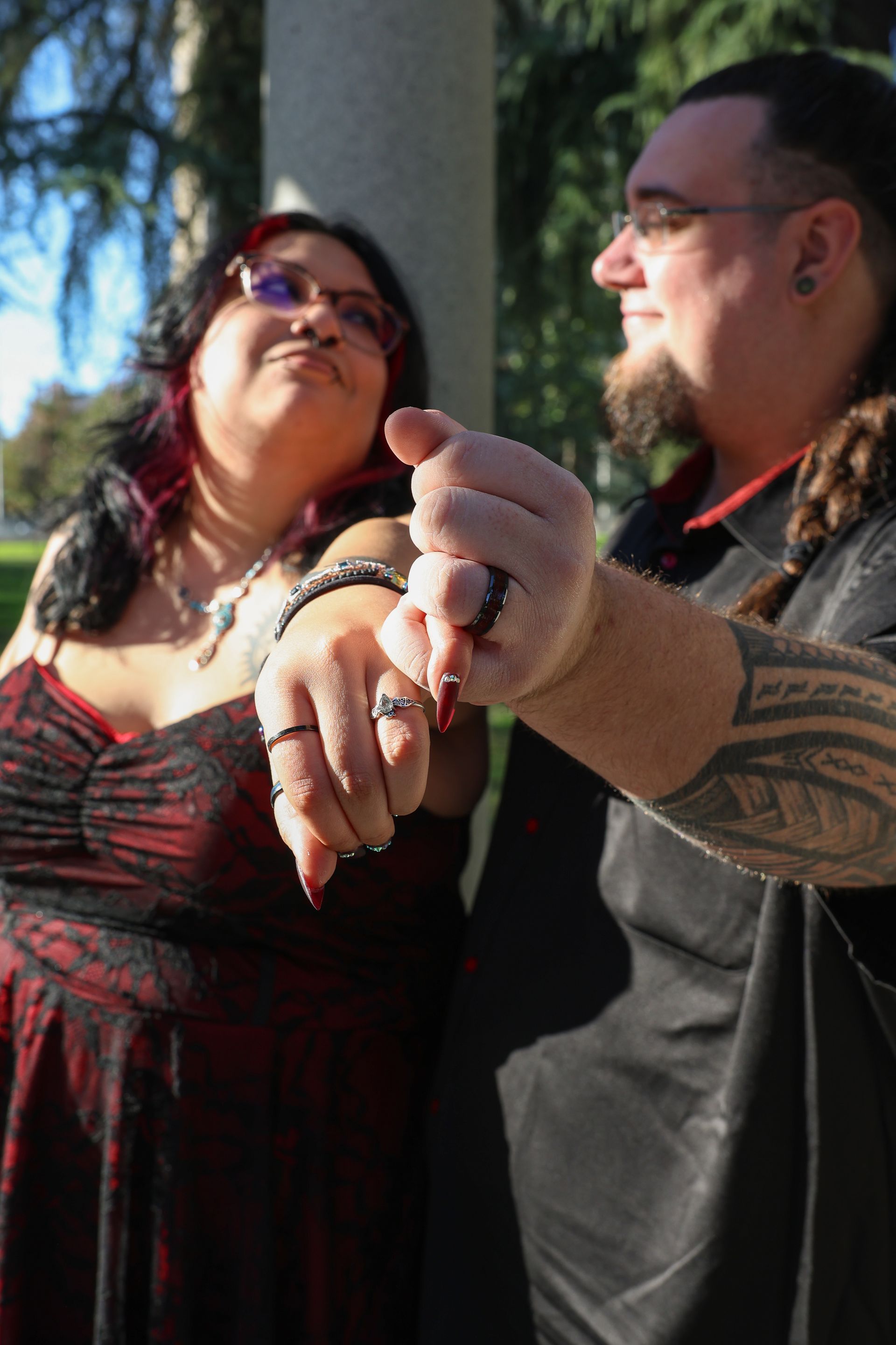 girl leaning on blue wall