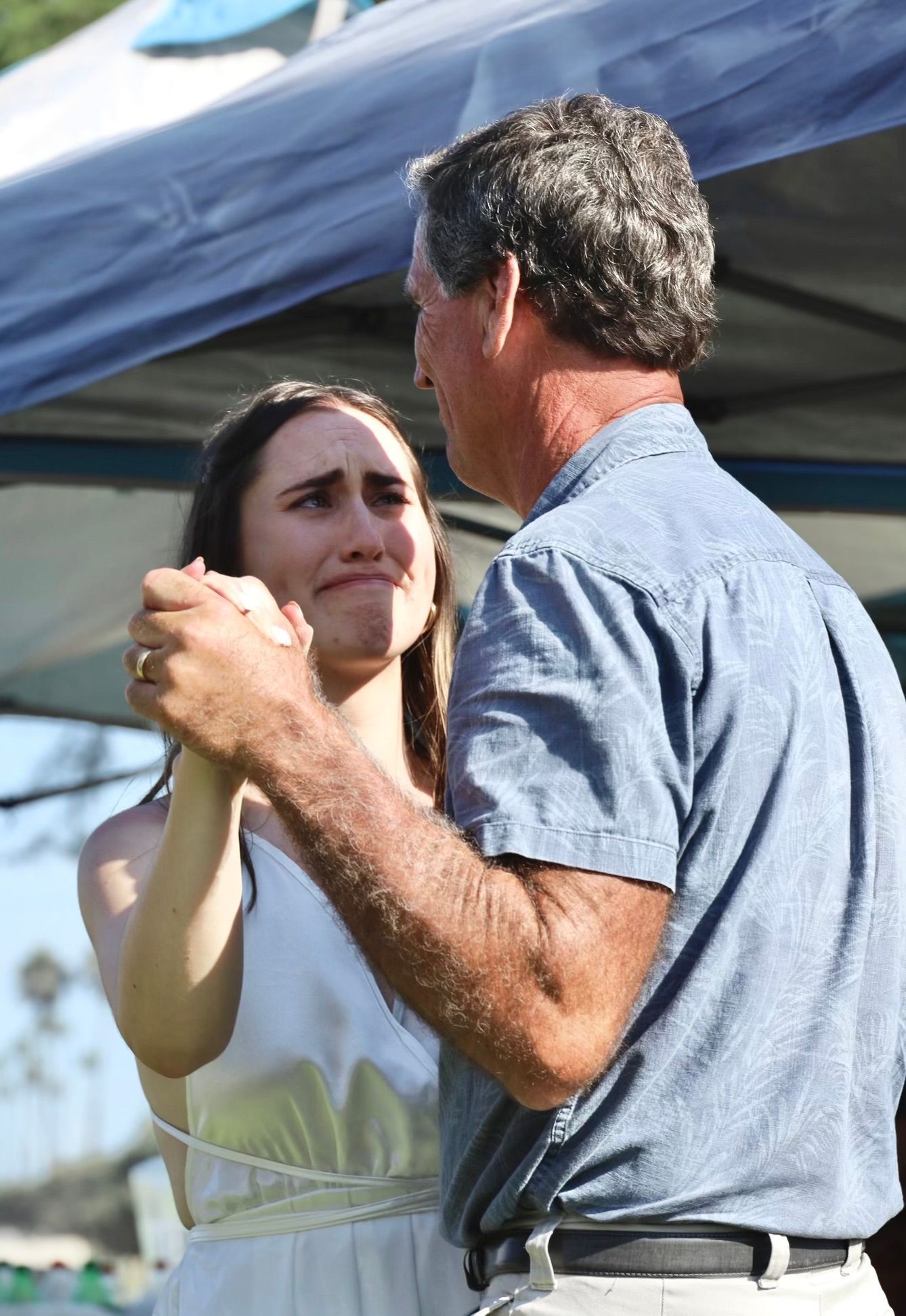 girl crying with dad