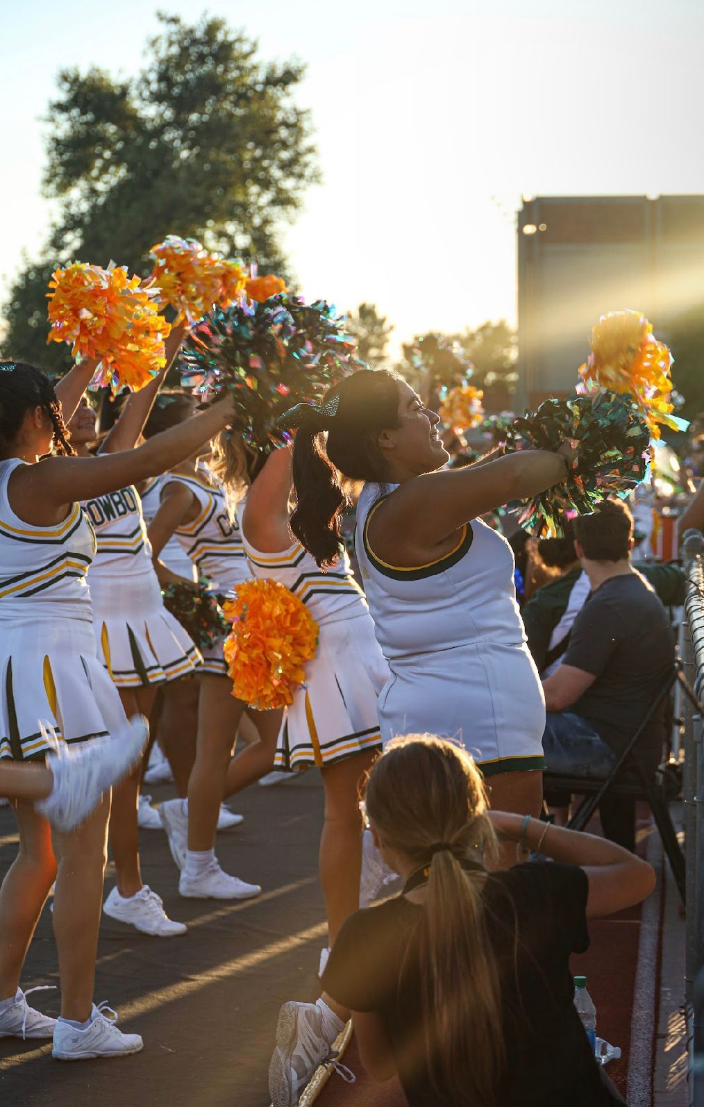 cheerleaders in sunset