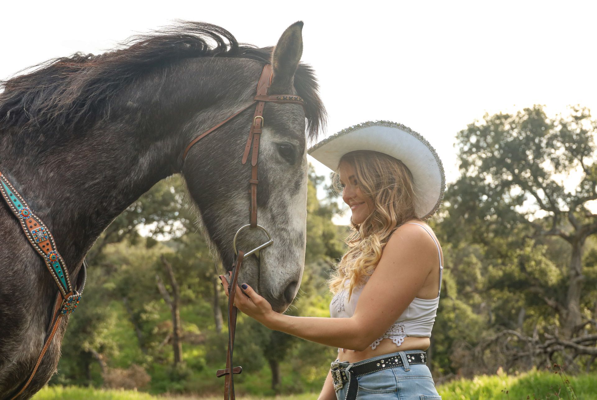 girl smiling at horse